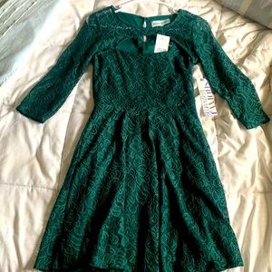 Small green dress. Never worn!! Brand is Almost Famous.